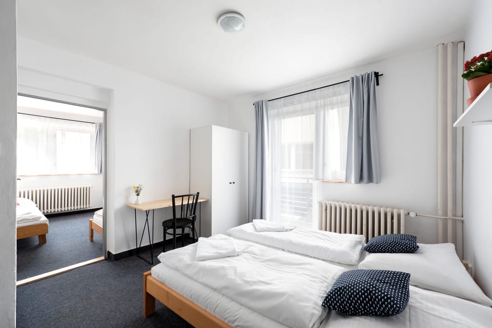 Two Bedroom Apartment with Living room | Desk, blackout drapes, iron/ironing board, free cribs/infant beds