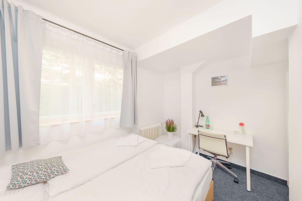 Economy Double Room | Desk, blackout drapes, iron/ironing board, free cribs/infant beds
