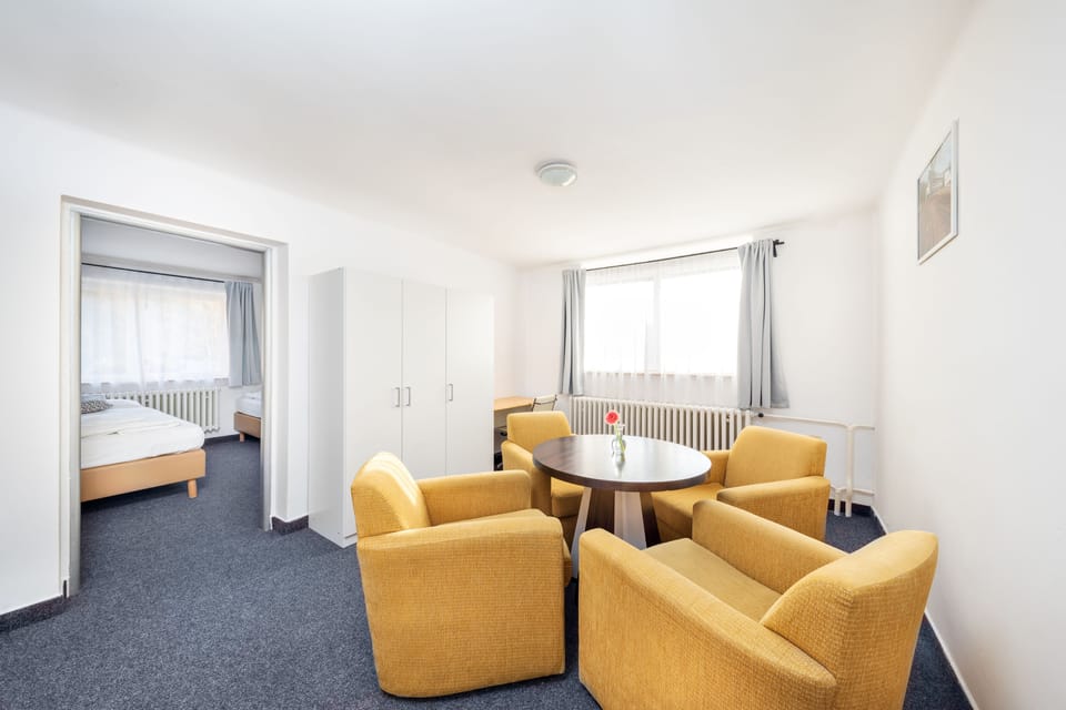 Two Bedroom Apartment with Living room | Desk, blackout drapes, iron/ironing board, free cribs/infant beds