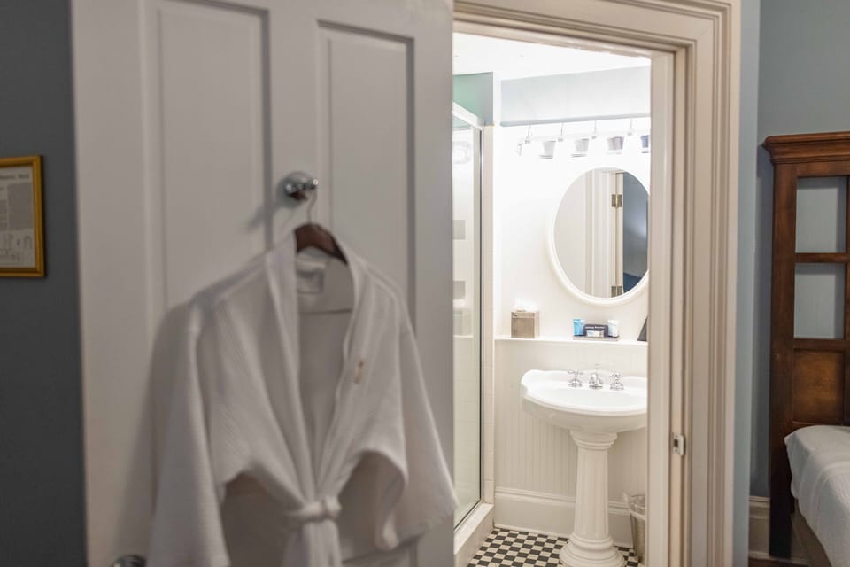 Designer toiletries, hair dryer, bathrobes, towels
