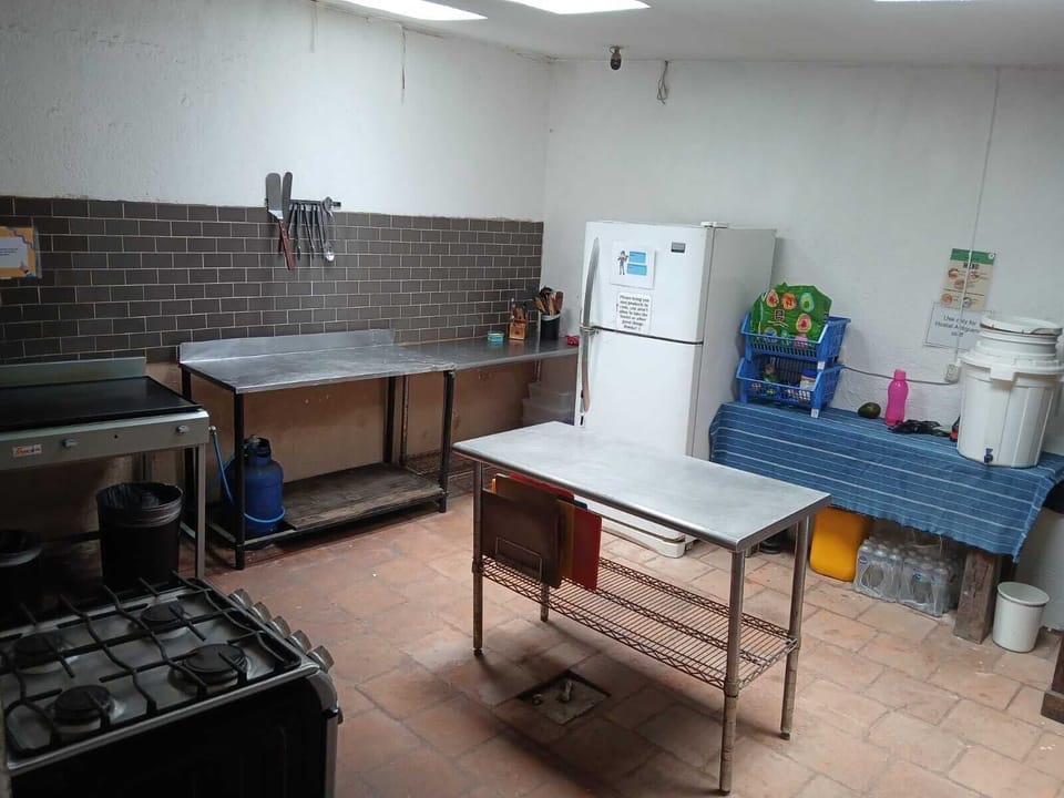 Full-size fridge, microwave, cookware/dishes/utensils, lobster pot