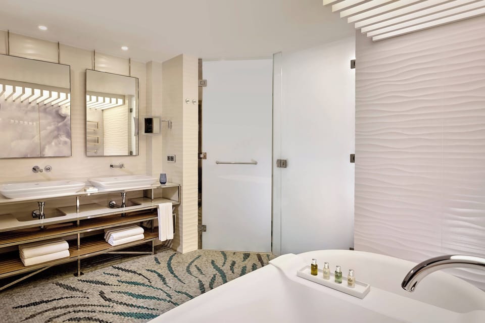 Family Suite, 2 Bedrooms, Balcony, Sea View | Bathroom | Separate tub and shower, deep soaking tub, free toiletries, hair dryer