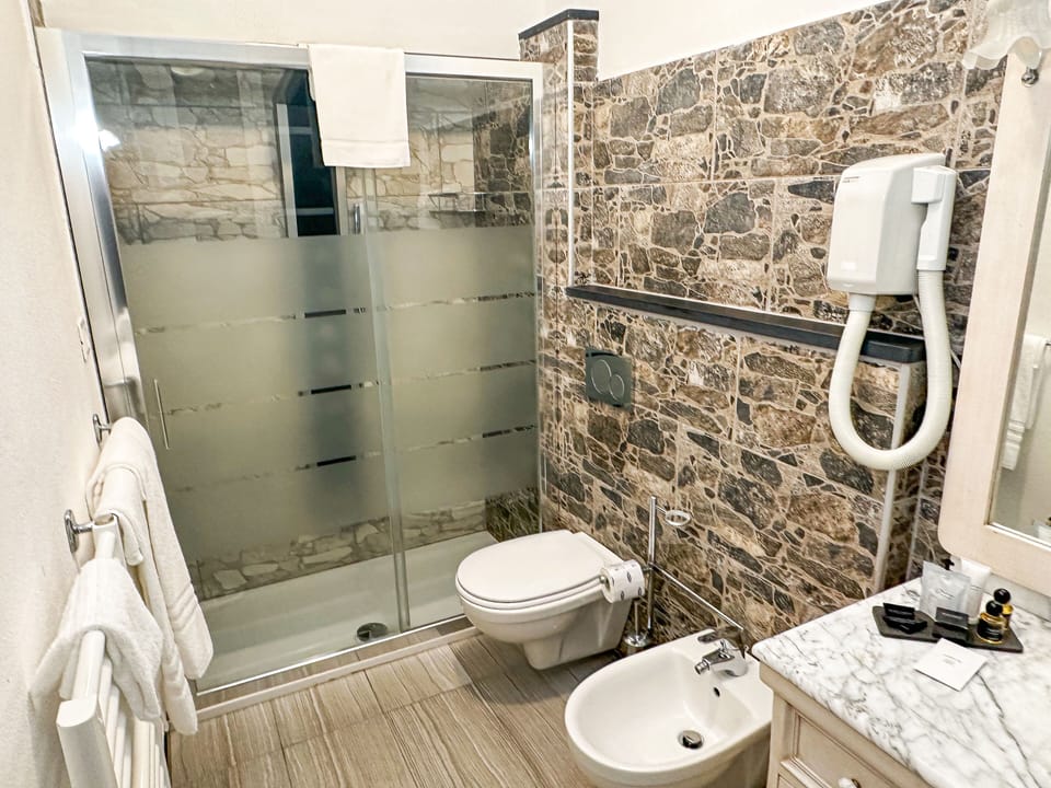 Panoramic Suite, 2 Bedrooms | Bathroom | Shower, free toiletries, hair dryer, bidet