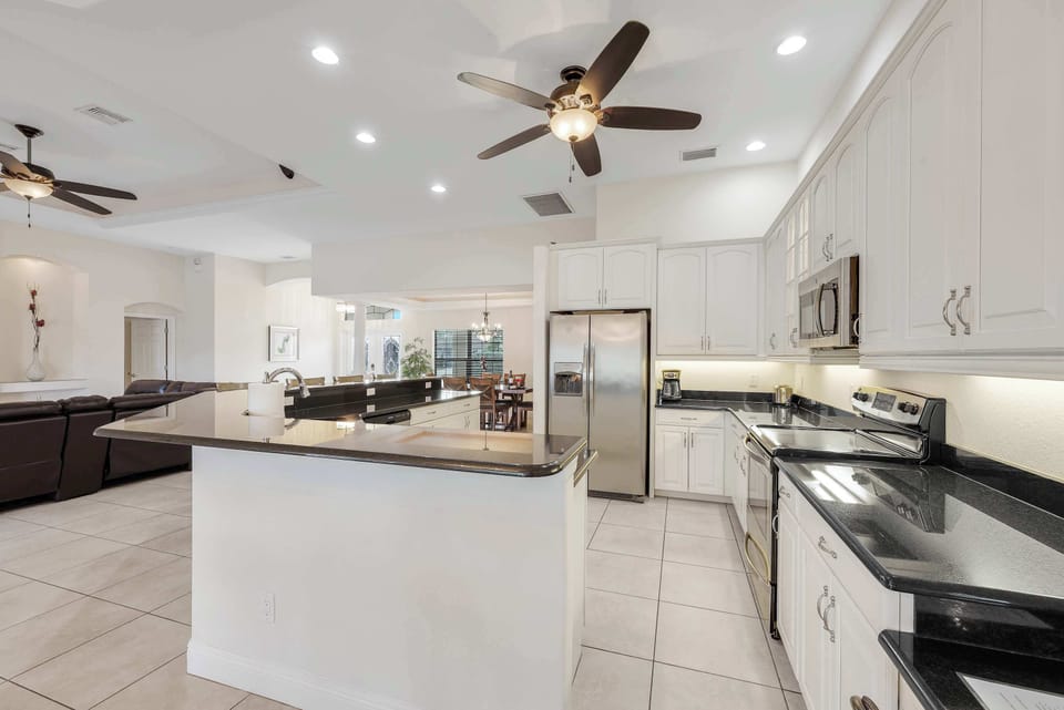 Lots of cabinets and stainless steel appliances