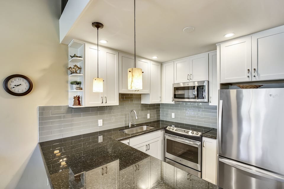 Kitchen - Updated cabinets, granite counters, new appliances