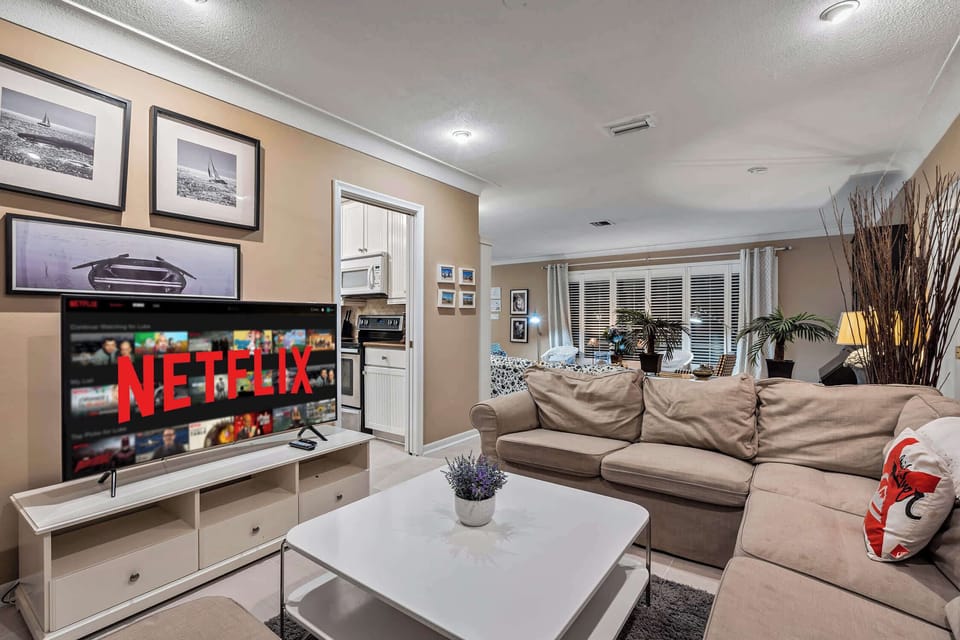 TV area next to kitchen with Roku, YouTube TV, and Netflix.