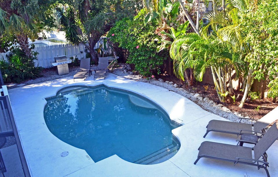 Private pool nestled within lush tropical vegetation