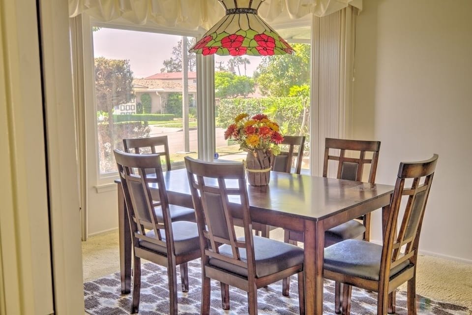 Formal dining with windows to the front of the home
