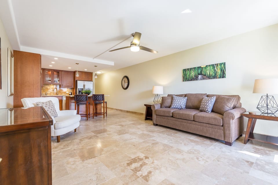 Open Floor Plan With Travertine Flooring Throughout