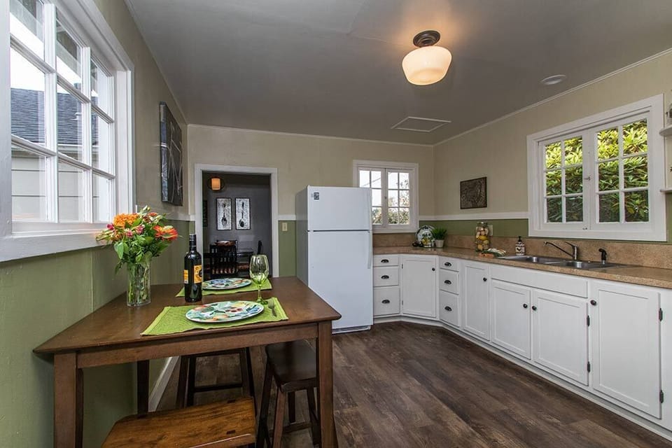 The kitchen is spacious, open and adjoins the dining room.