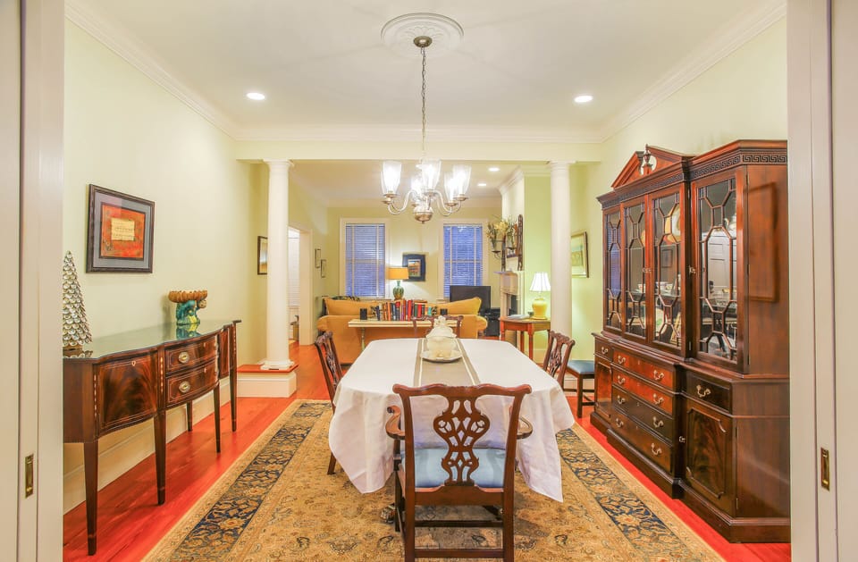 The open dining and living area are the perfect space for a family to hang out after a day of seeing Savannah's sights.