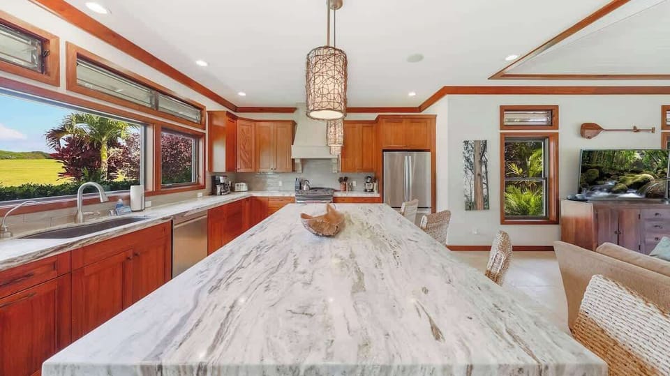 Island is ideal for family meals in this Poipu home