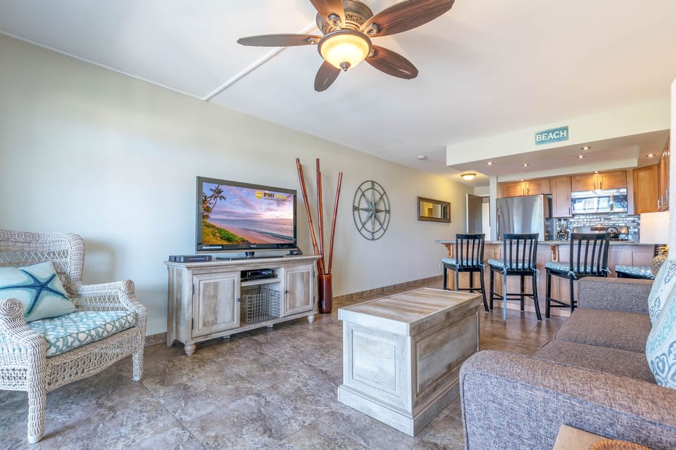 Living Room Area With A Large Flat Screen TV