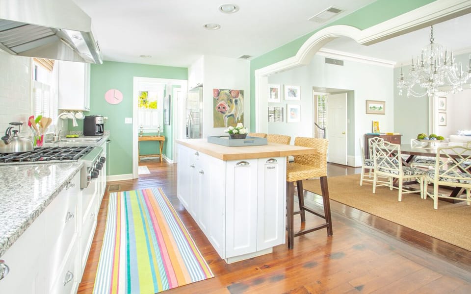 The kitchen opens up to the dining room.