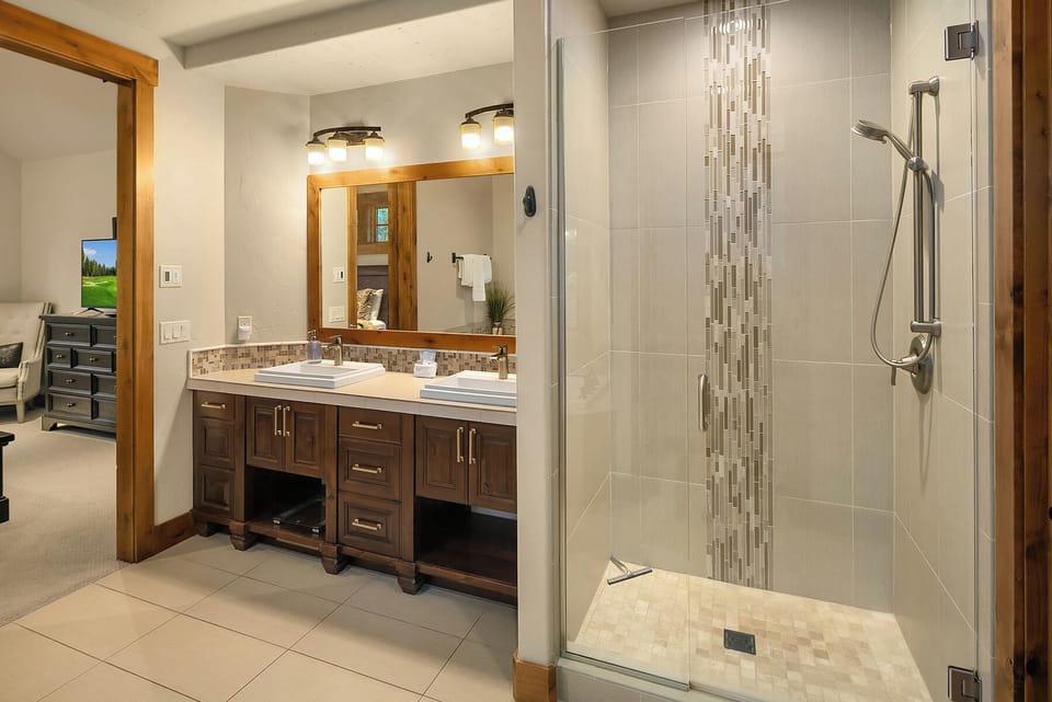 Three Sisters Lodge. - Walk in shower in the master bathroom.