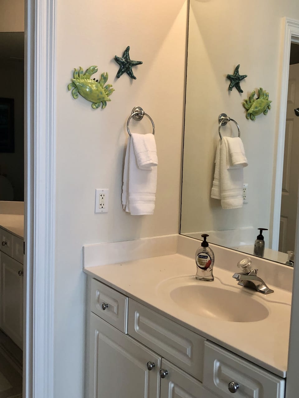 Master bedroom dressing area vanity just outside of full large master bath