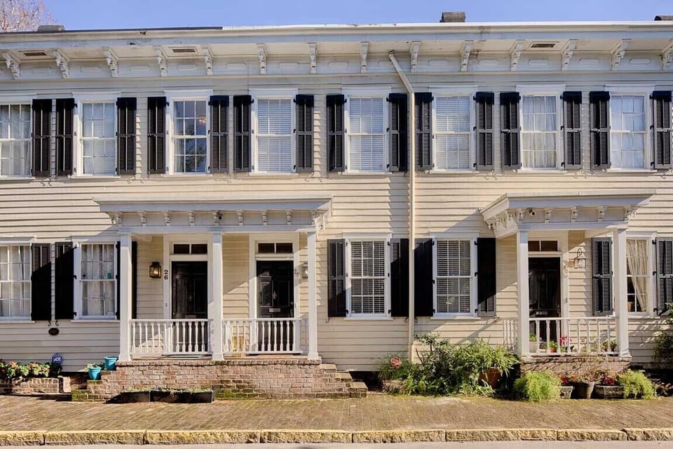 Washington Square Abode is the center townhome.