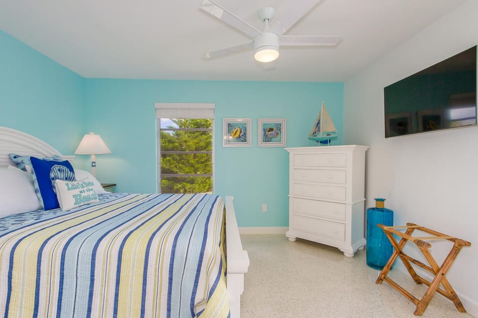 Primary Bedroom with King Bed and Flat Screen TV