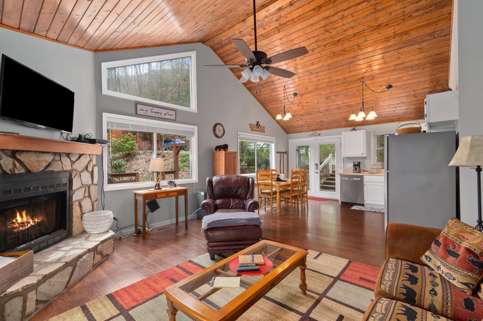 Large open-concept living area.  Gas fireplace, smart TV, eat in kitchen. 