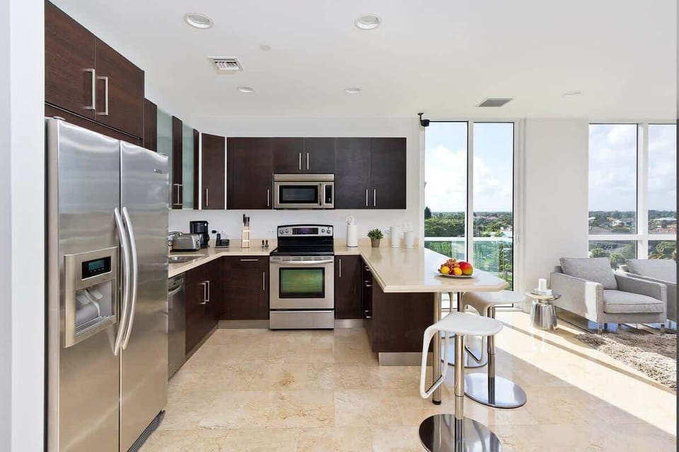 A modern kitchen with marble floors