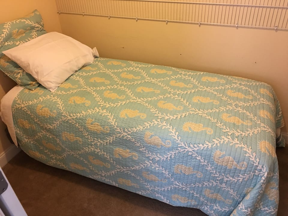 XL Twin Bed located off the Master Bedroom