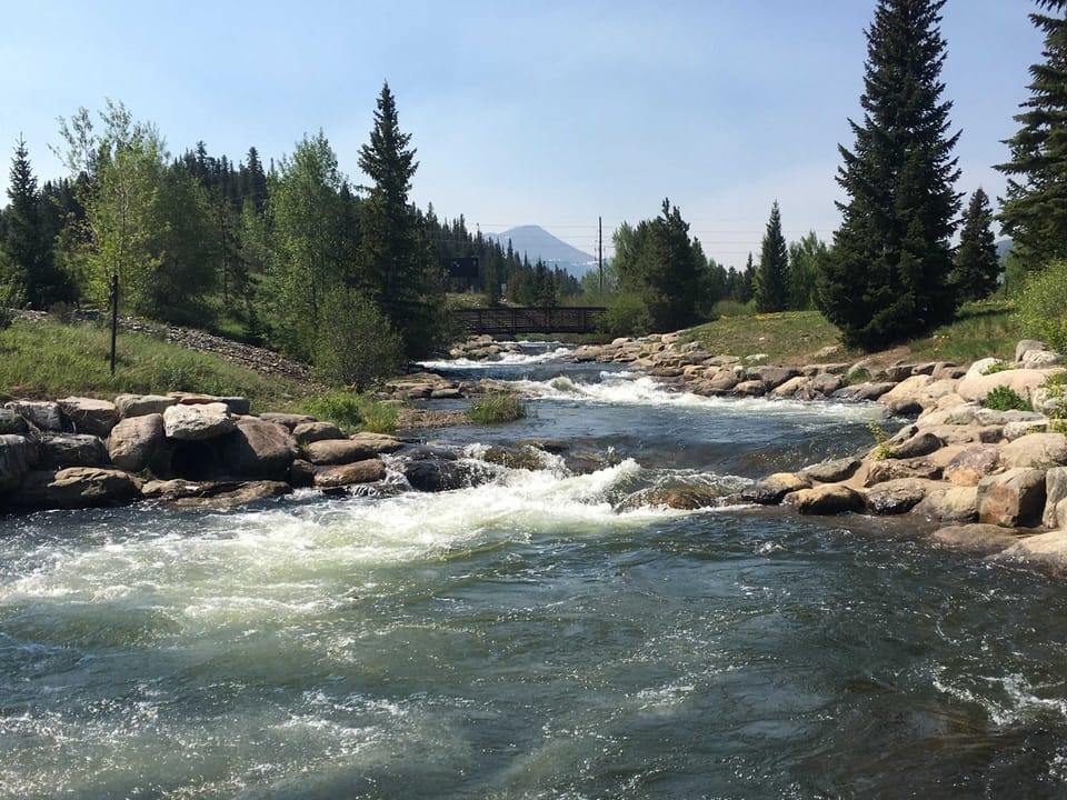 The Blue River winds through Breckenridge, offering stunning scenery and excellent fly fishing opportunities for anglers of all skill levels.