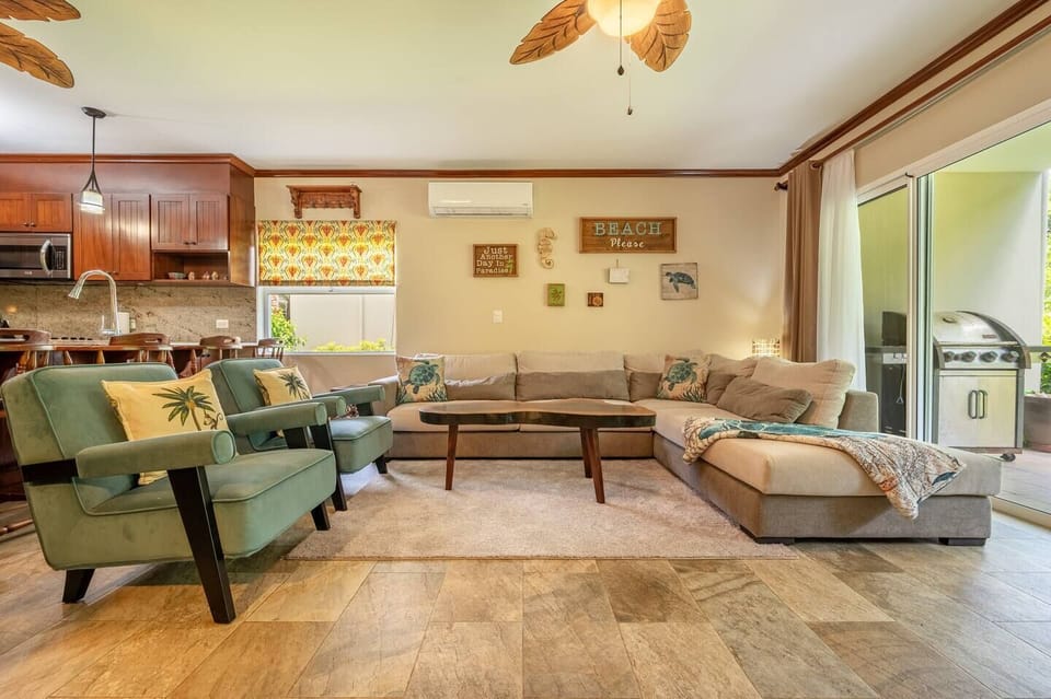 Cool up  inside and meet with your family and friends in this cozy living space. It has plenty of room to sit in comfortable couch and chairs.