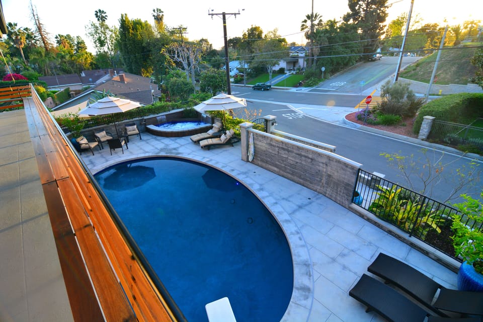 Looking down at the pool from the wrap-around deck
