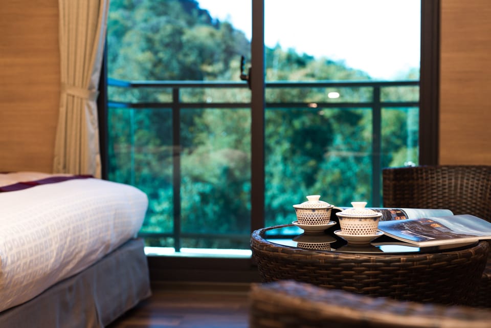 Standard Quadruple Room | Living area | 42-inch TV with digital channels, foosball, table tennis