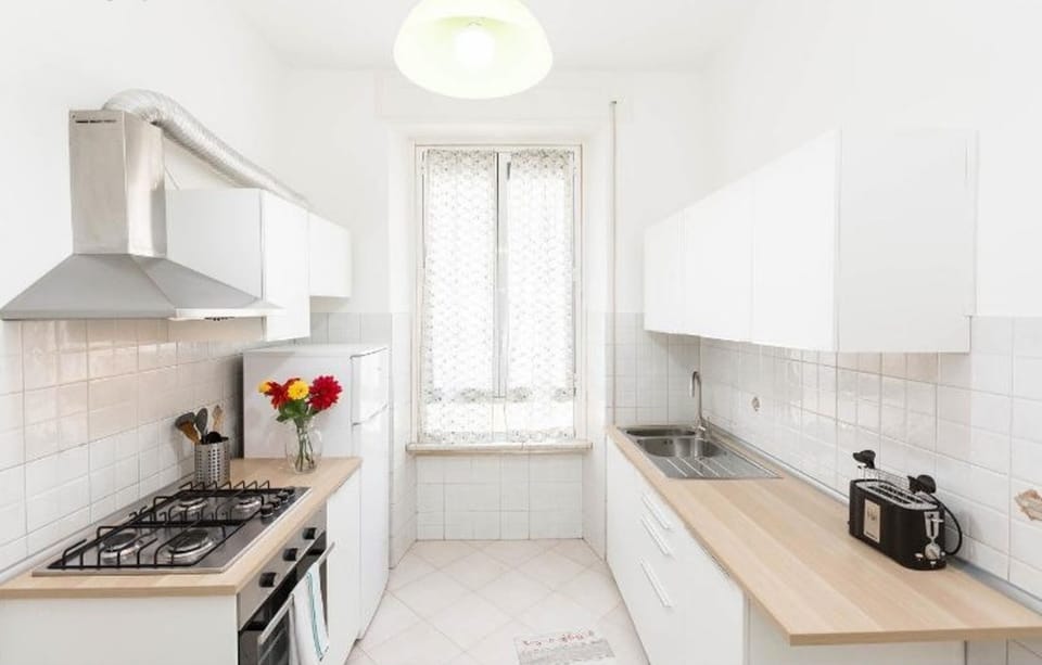 Full-size fridge, oven, stovetop, espresso maker