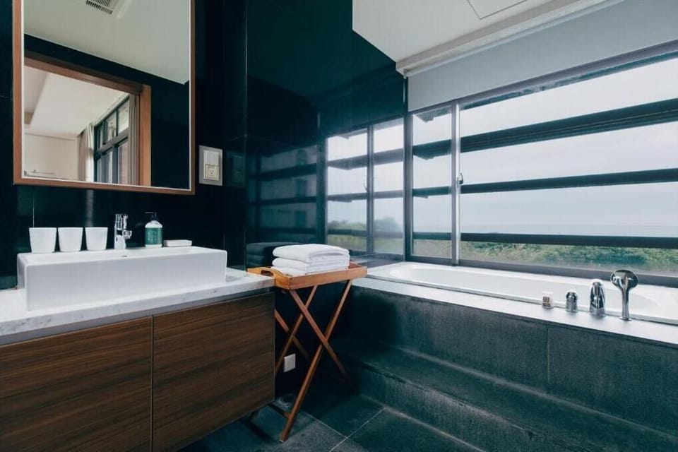 Superior Triple Room, Ocean View | Bathroom | Free toiletries, hair dryer, slippers, towels