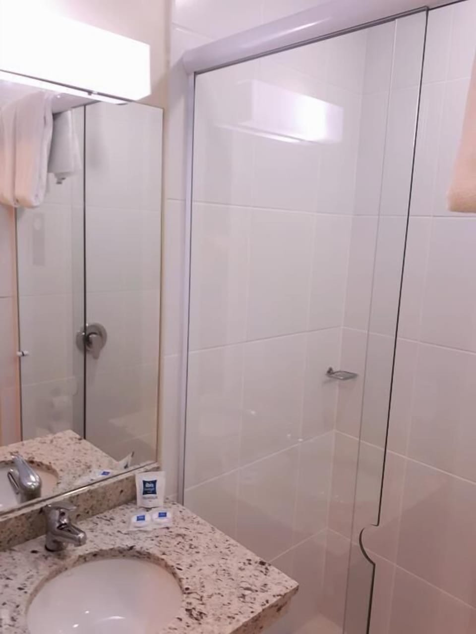 Shower, eco-friendly toiletries, hair dryer, towels