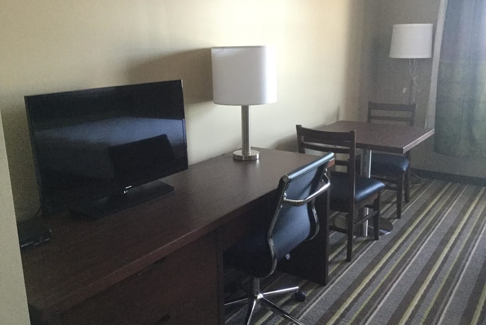 Desk, blackout drapes, WiFi (free), bed sheets