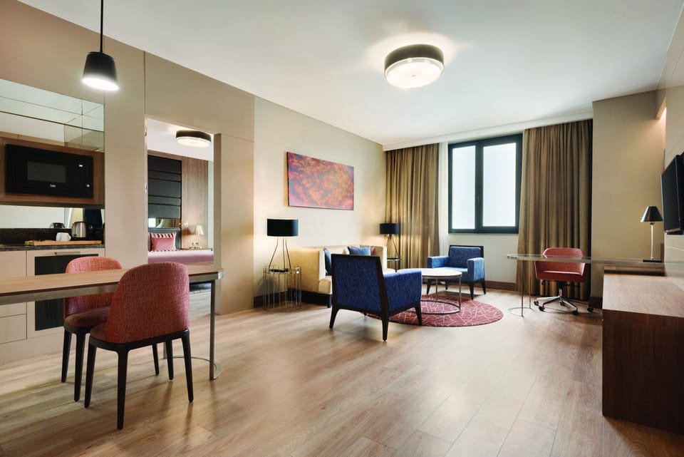Luxury Suite, 1 Queen Bed, Accessible, Non Smoking (Mobility) | Premium bedding, minibar, in-room safe, individually decorated