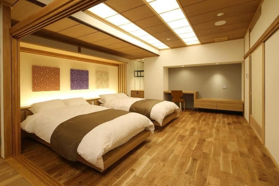 Deluxe Twin Room 50sqm - Mountain View | Minibar, in-room safe, laptop workspace, WiFi (free)