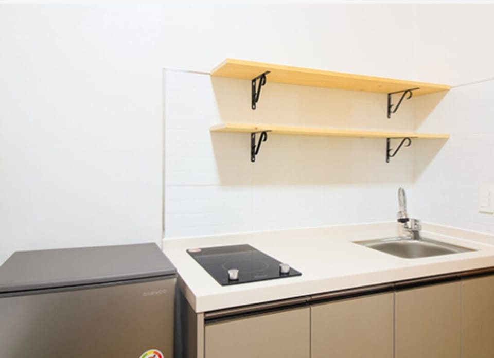 Full-size fridge, microwave, stovetop, rice cooker