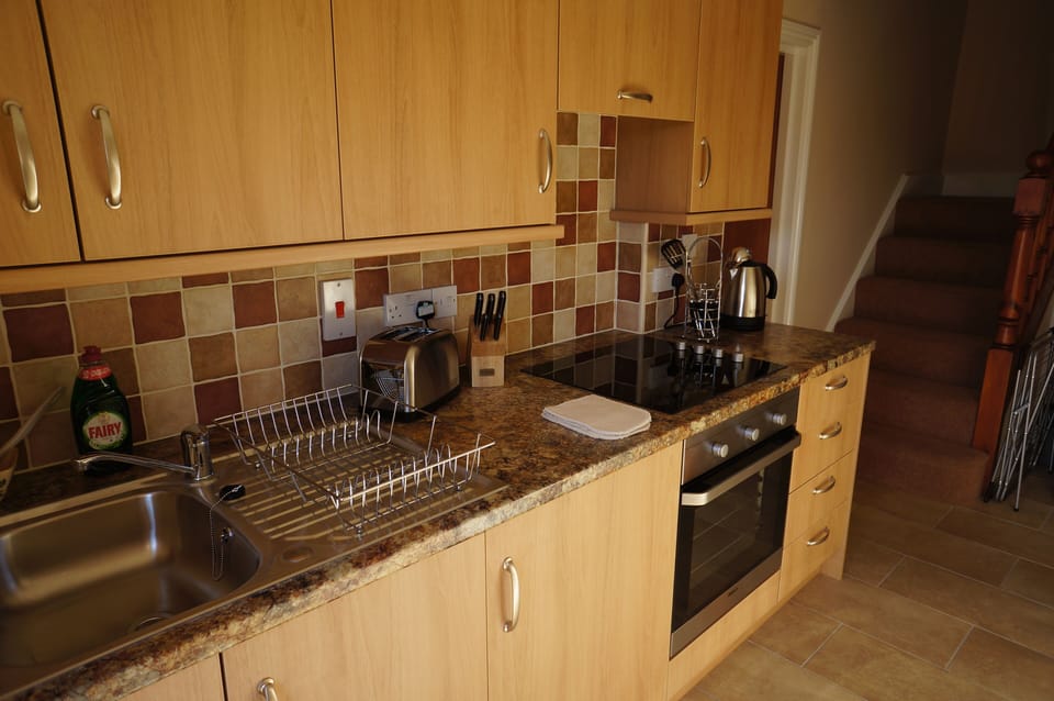 Your Fully Fitted Kitchen with everything you need to prepare your cosy supper