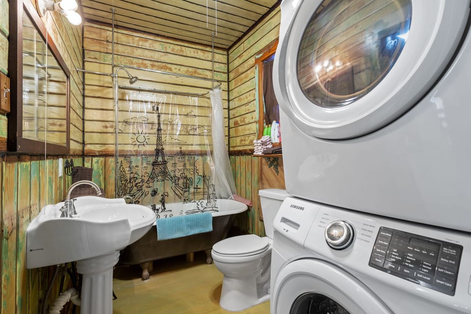 Downstairs Shared Bath.  Shower and Clawfoot soaking tub.