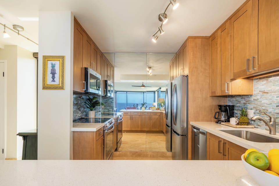 A spacious kitchen designed for convenience and sophistication with premium finishes design and practical amenities
