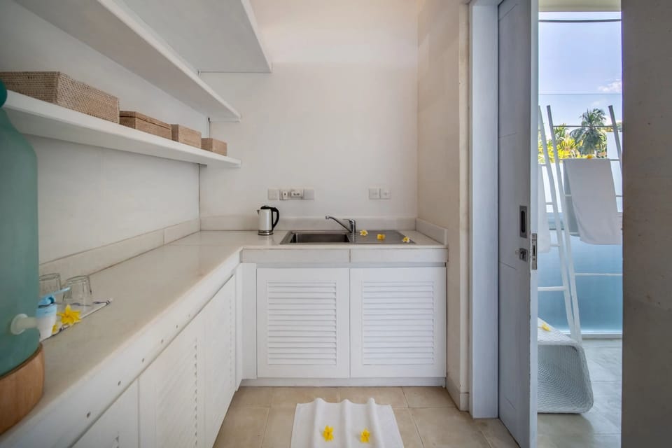 Sunshine Suite | Private kitchen | Mini-fridge, electric kettle