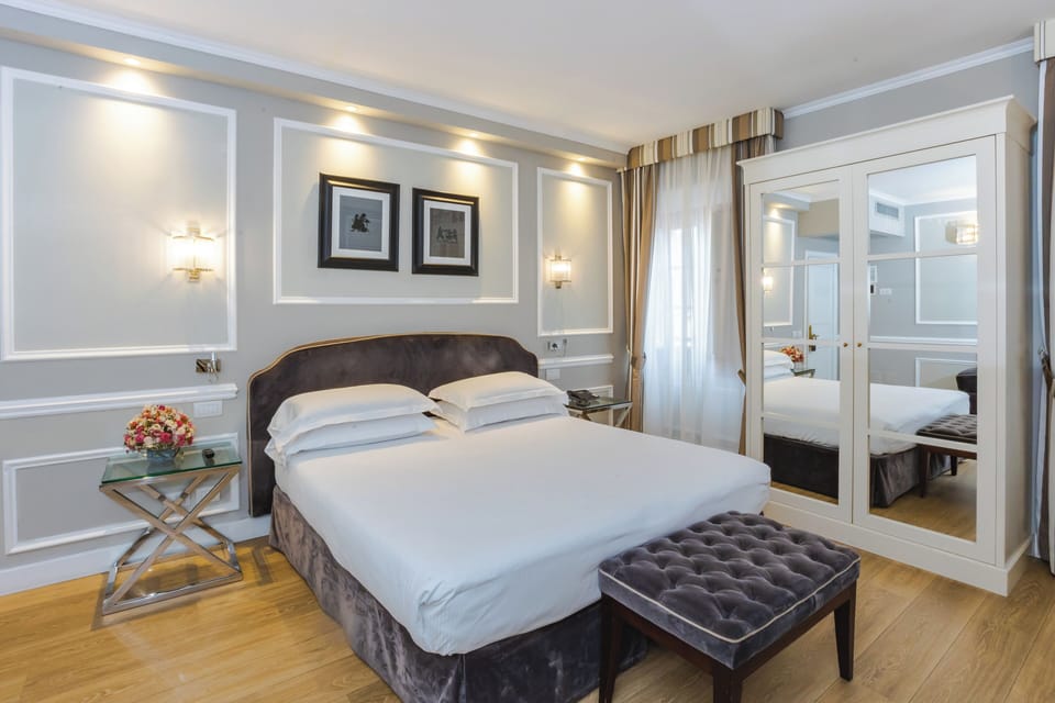 Superior Double or Twin Room | Minibar, in-room safe, desk, blackout drapes