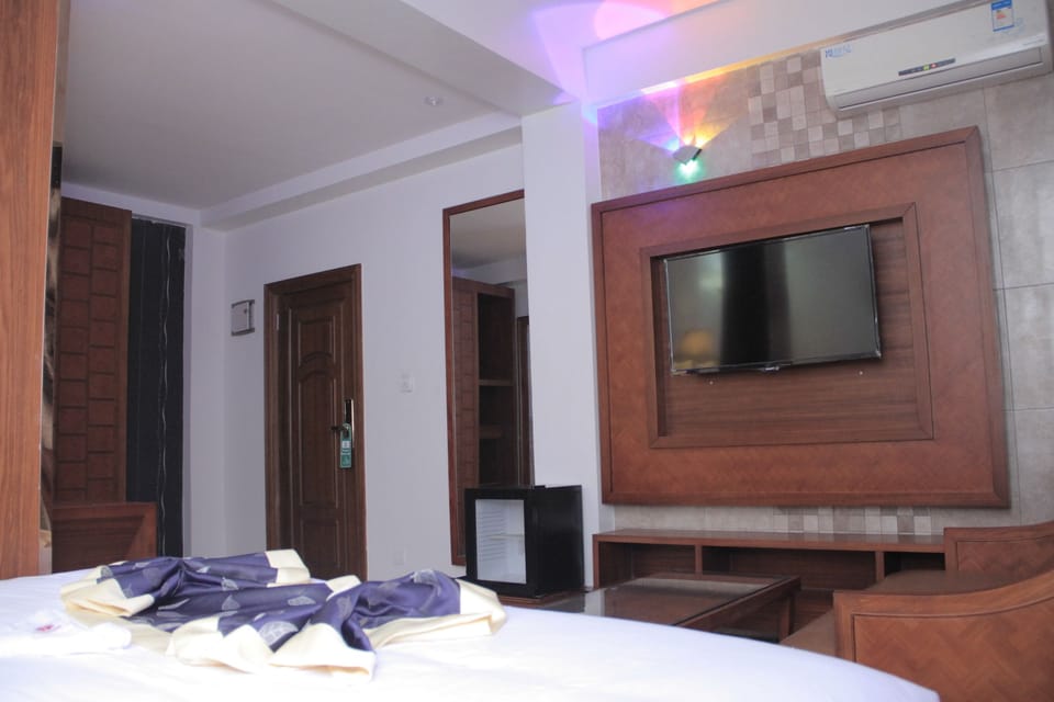 Standard Double Room | Living area | TV