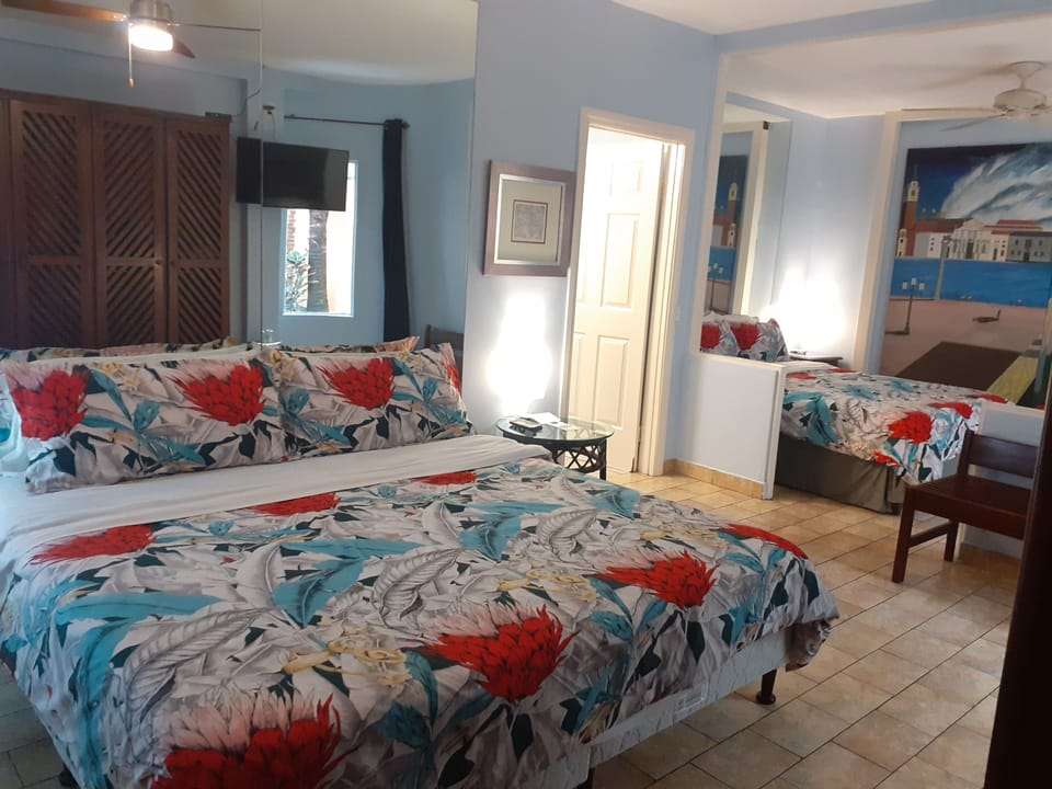Superior Suite, Multiple Beds | In-room safe, individually decorated, individually furnished, desk