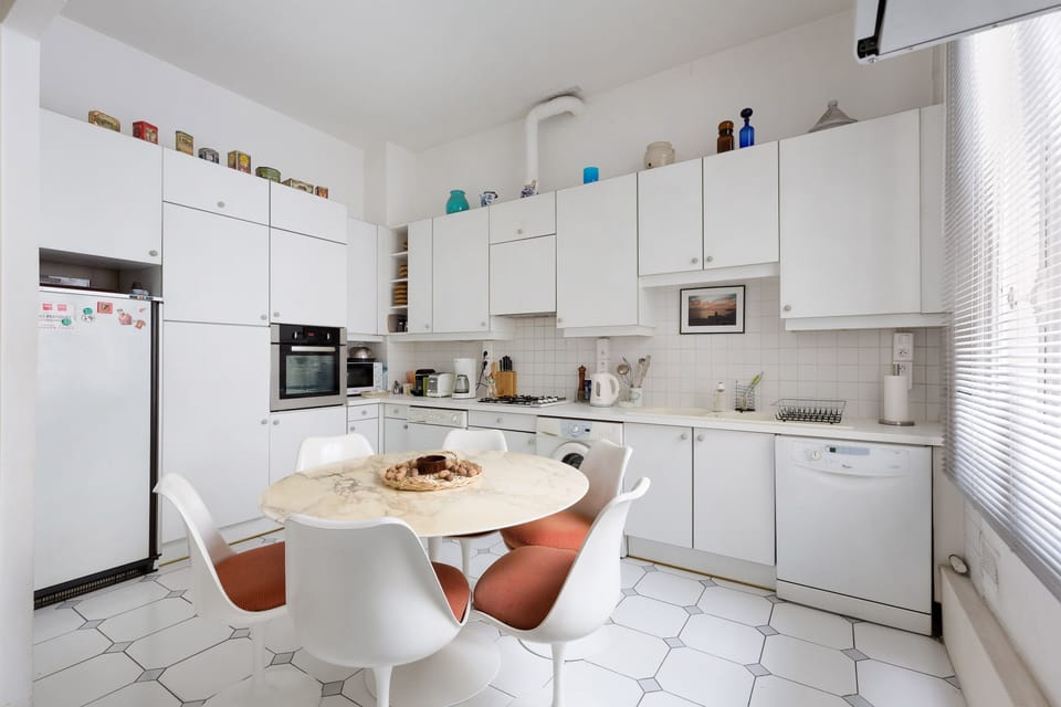 Kitchen with a table for 6