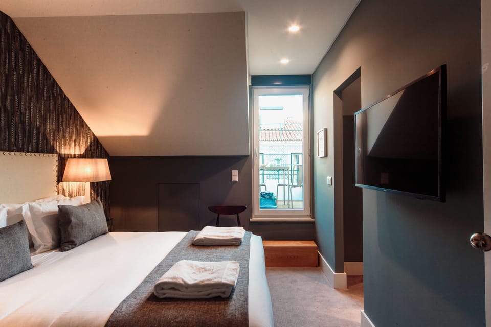 Double or Twin Room, Terrace (Mansard) | Minibar, in-room safe, individually decorated, individually furnished