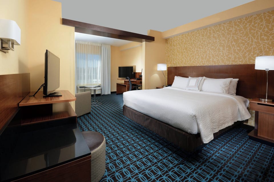 Pillowtop beds, desk, laptop workspace, blackout drapes