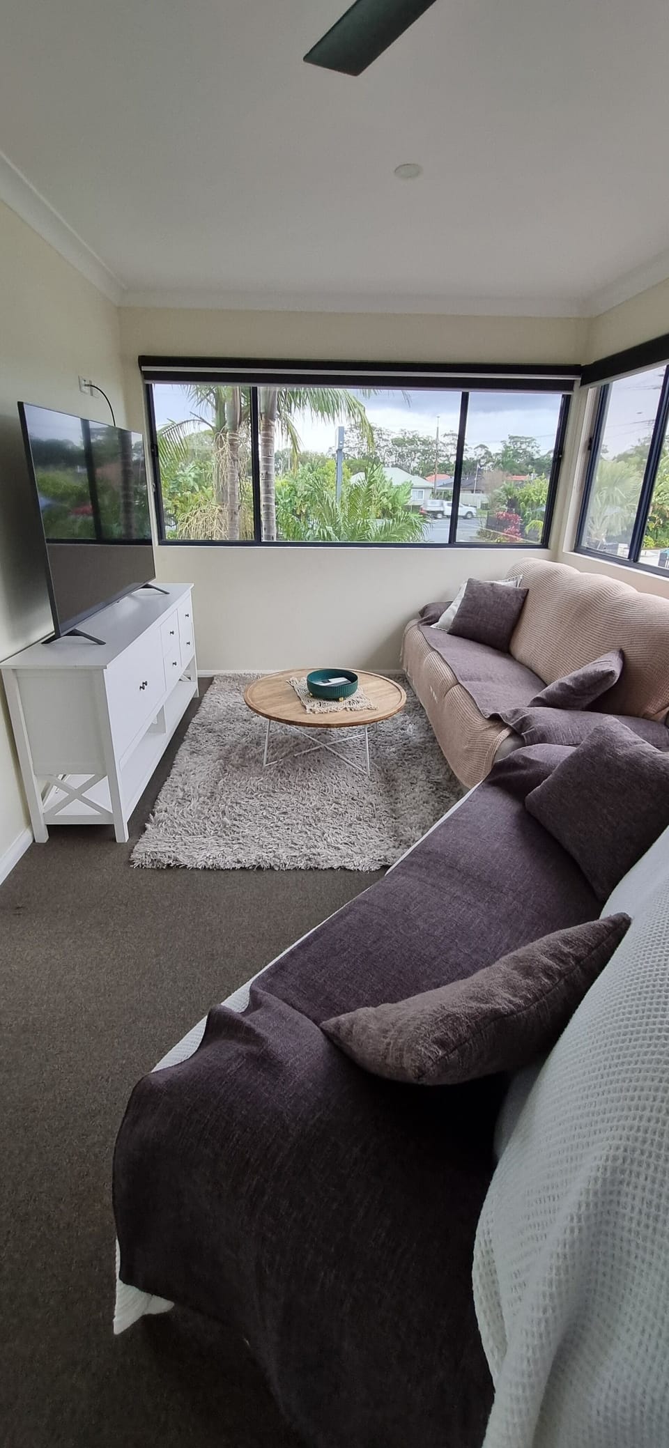 Two Bedroom Unit Apartment | Living area | 52-inch flat-screen TV with digital channels