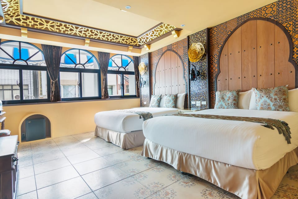 Grand Quadruple Room | Individually decorated, blackout drapes, free WiFi, bed sheets