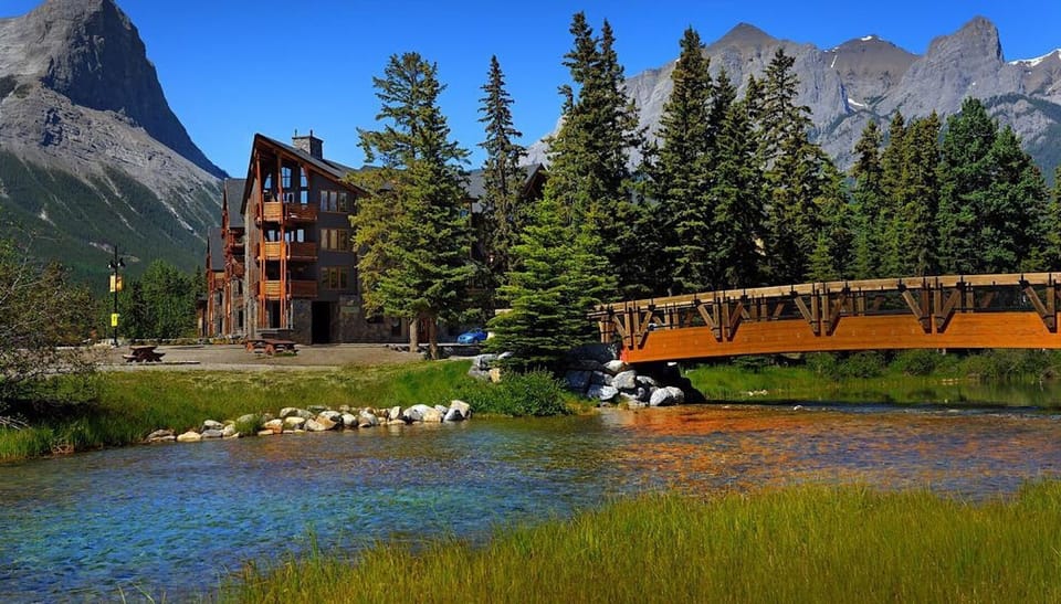 View of Rundle Cliffs Lodge from across the bridge at Policemans Creek