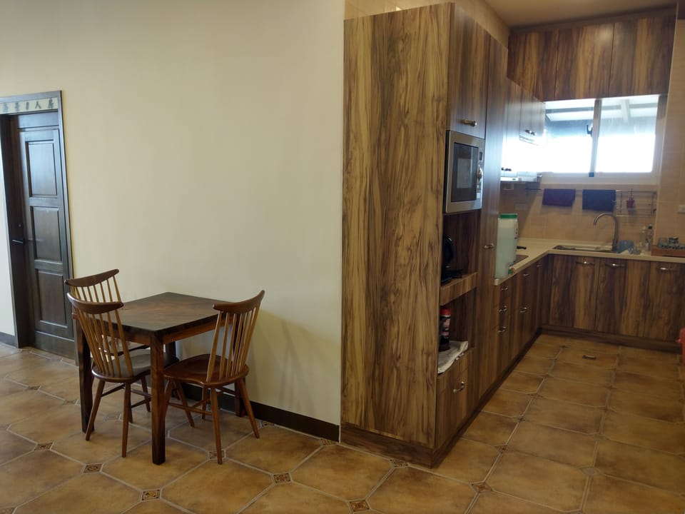 Family Room, Ocean View | Shared kitchen | Fridge, microwave, oven, stovetop